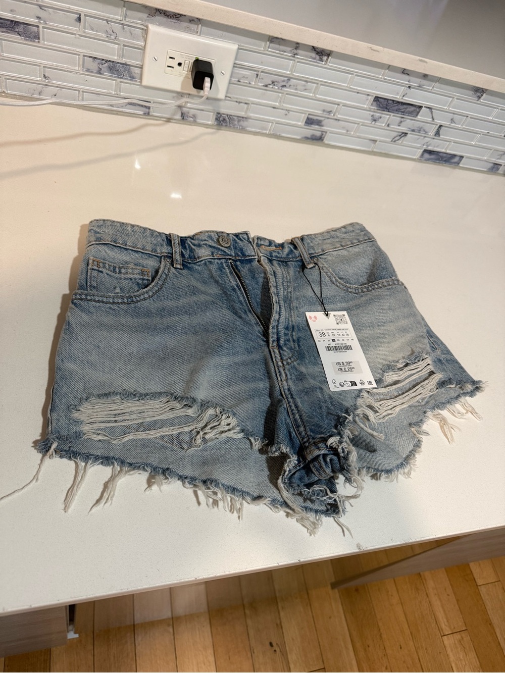 Zara Light Blue Distressed Denim Cutoff Shorts